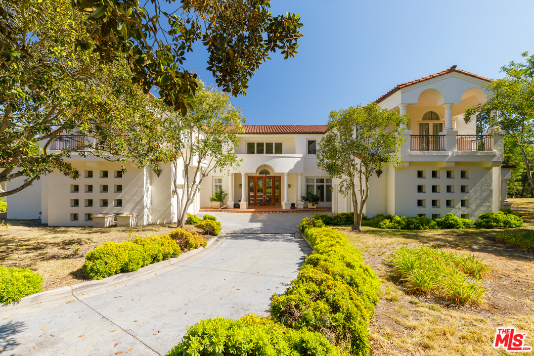 73 Beverly Park Lane Beverly Hills, CA 90210 - Photo 24 of 24 a view of swimming pool with outdoor seating