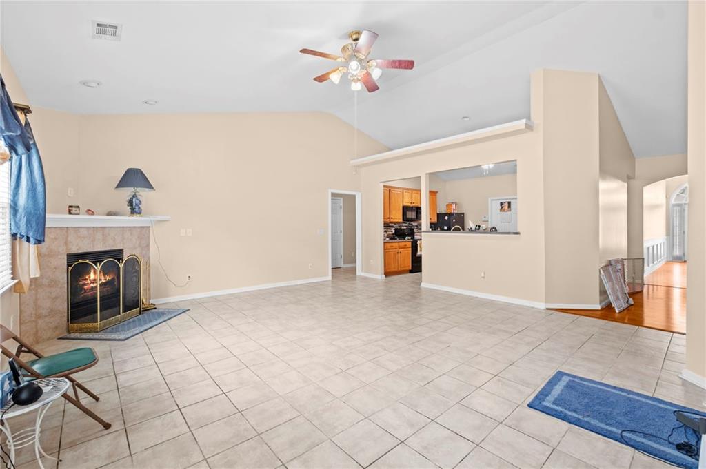 Undisclosed Address Atlanta, GA 30331 - Photo 8 of 25 a view of an empty room with a fireplace