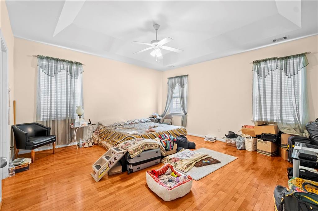 Undisclosed Address Atlanta, GA 30331 - Photo 9 of 25 a bedroom with bed and a window