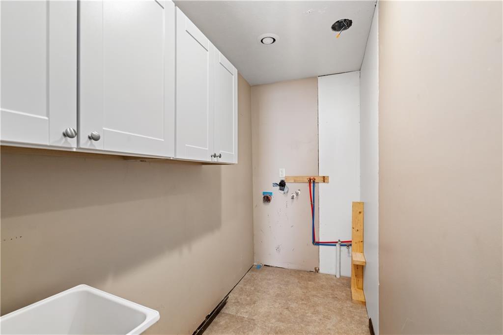 109 North Main Street Houston, PA 15342 - Photo 11 of 25 a bathroom with a sink