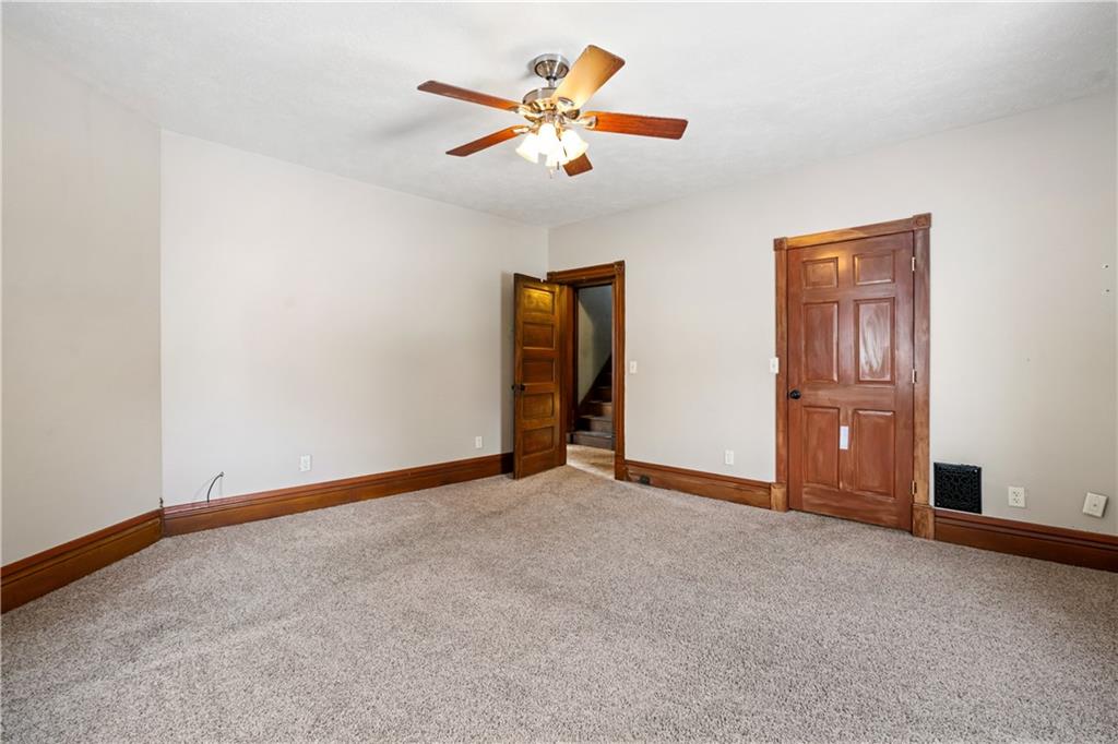 109 North Main Street Houston, PA 15342 - Photo 14 of 25 an empty room with closet and fan