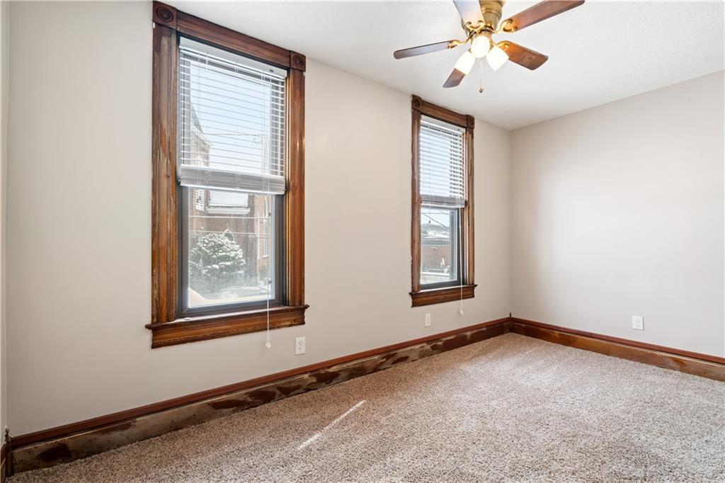 109 North Main Street Houston, PA 15342 - Photo 15 of 25 a view of an empty room with a window