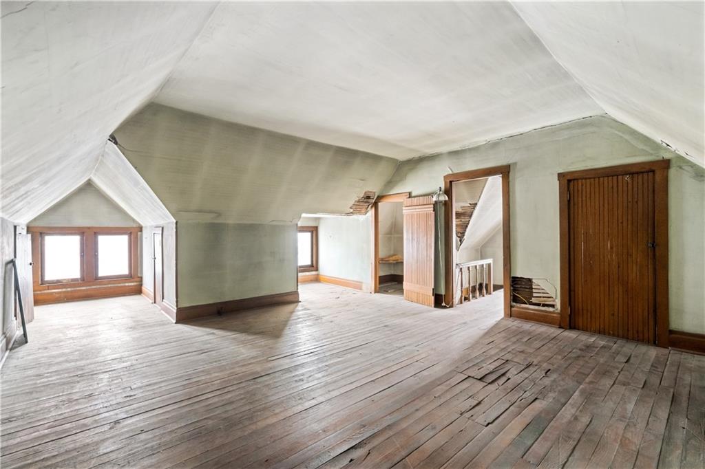109 North Main Street Houston, PA 15342 - Photo 20 of 25 a view of a house with a wooden floor and a window