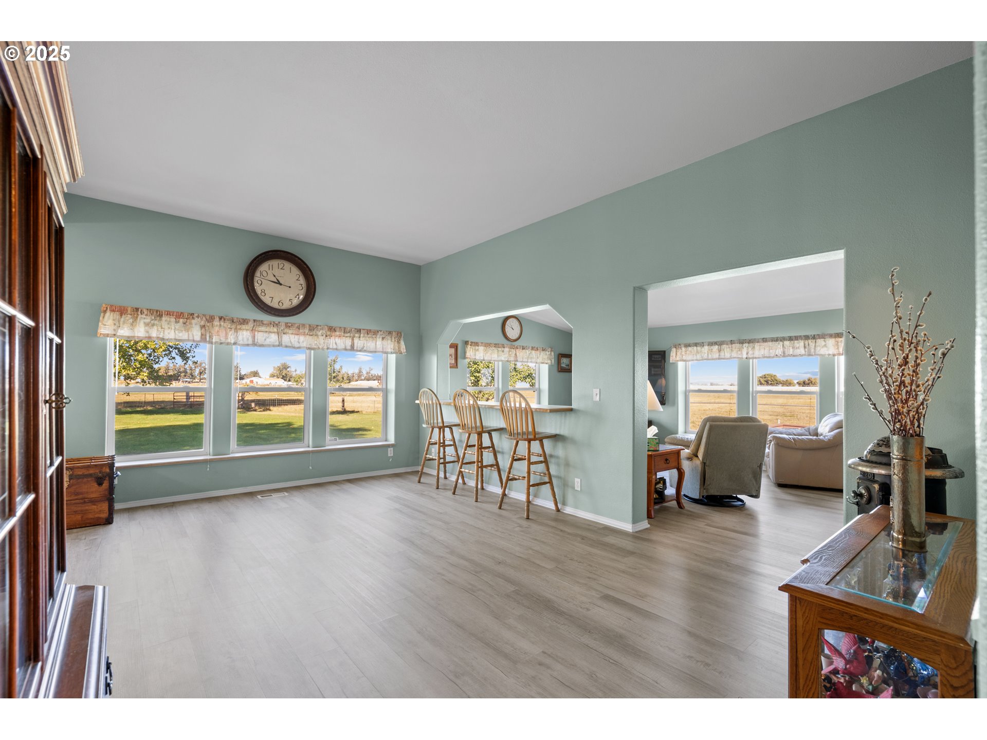 34656 County 1172 Road Stanfield, OR 97875 - Photo 16 of 48 a view of an empty room with window and wooden floor