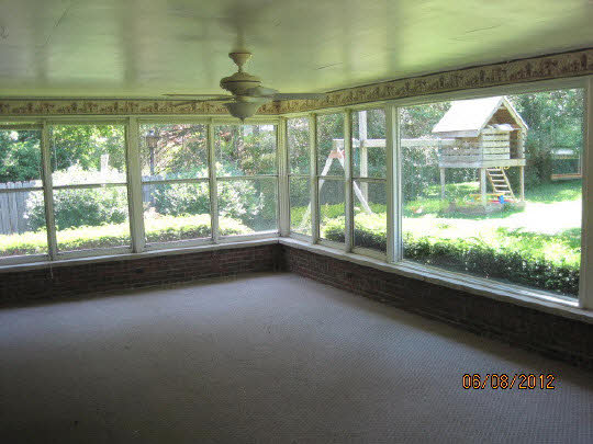 13491 East Bethel Road Rochelle, IL 61068 - Photo 9 of 11 a view of a big room with wooden floor from a glass door