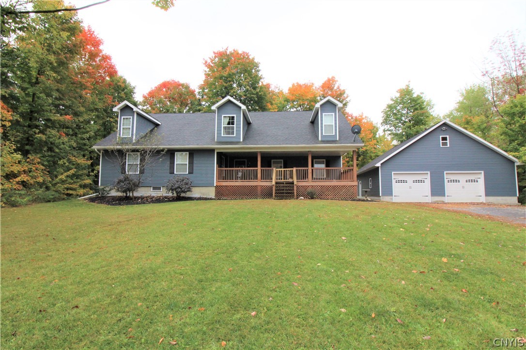 33764 Whittaker Road Champion, NY 13619 - Photo 1 of 1 Front of home. Large covered porch. Over sized 2 s