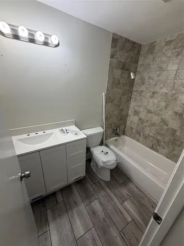 a bathroom with a sink and a bathtub