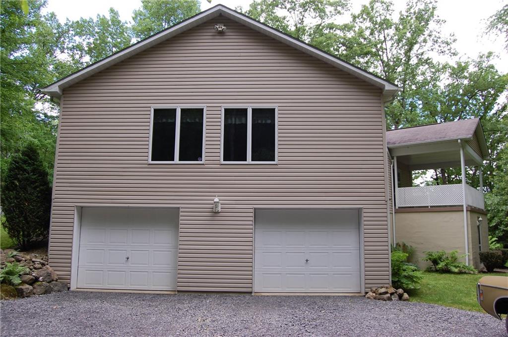 796 Old Mercer Road Mercer, PA 16137 - Photo 8 of 21 2 Car Integral Garage with a gas heater and insulated garage doors.