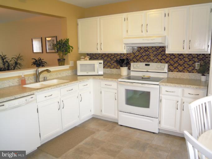 607 Brickston Road Reisterstown, MD 21136 - Photo 22 of 30 White Cabinetry..neutral counters..all appliances