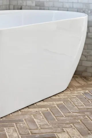 a view of a bathtub in a room