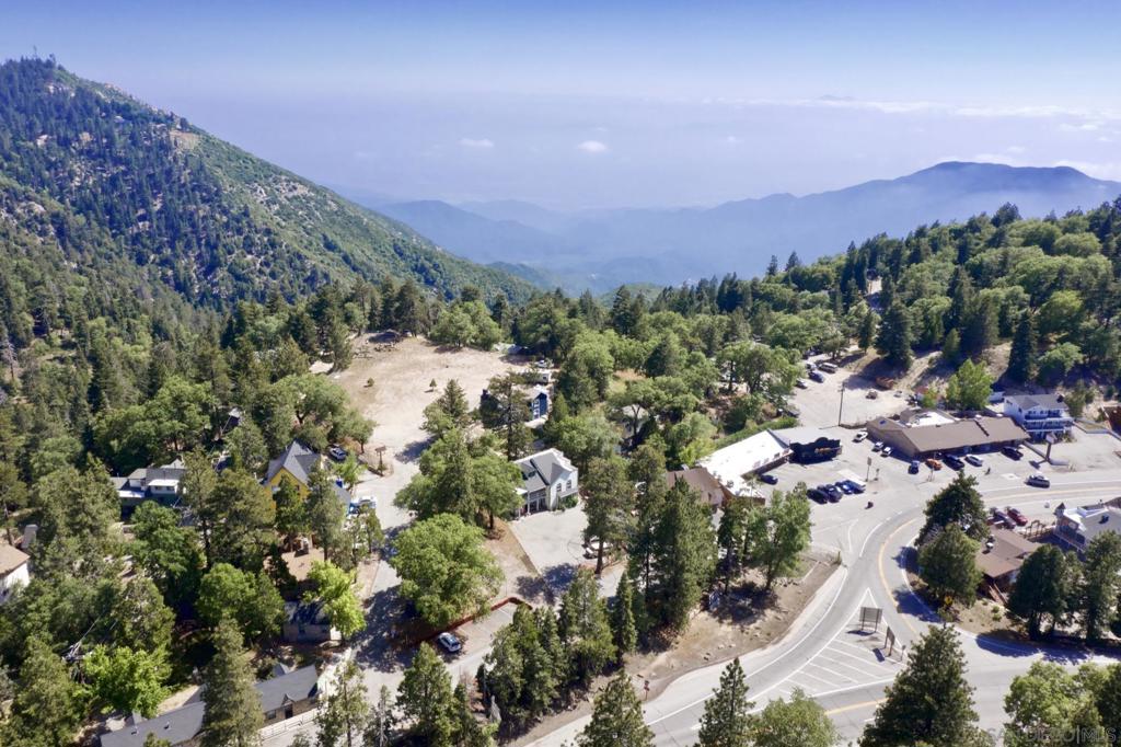 32065 Hunsaker Way Running Springs, CA 92382 - Photo 11 of 39 an aerial view of a houses with a street and trees