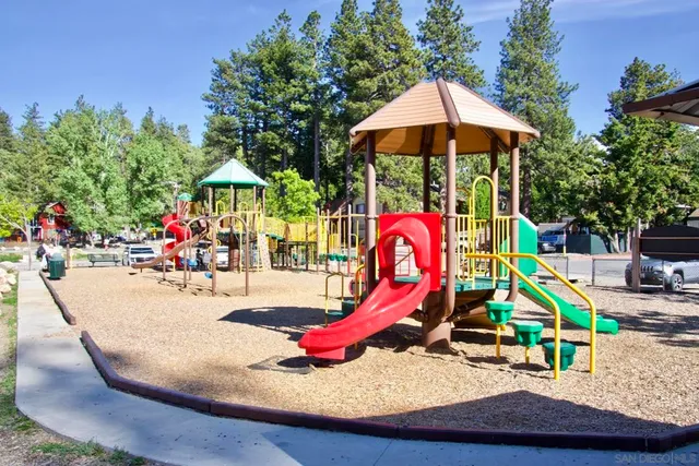 a view of multiple houses with a street
