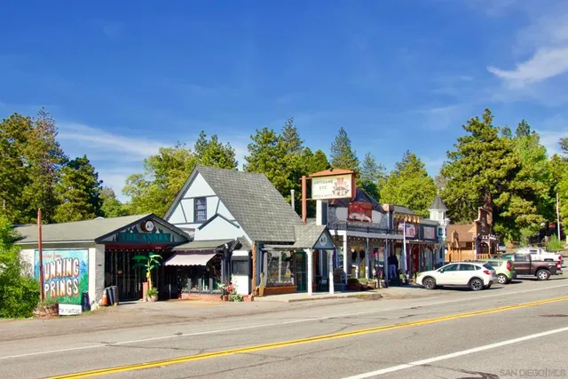 a view of a street with cars