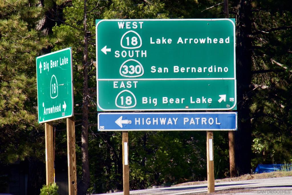 32065 Hunsaker Way Running Springs, CA 92382 - Photo 27 of 39 a sign that is on the side of a building