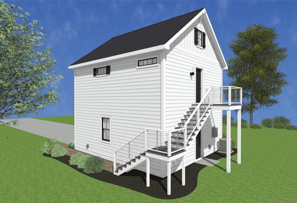 32065 Hunsaker Way Running Springs, CA 92382 - Photo 31 of 39 a white building with a yard and deck