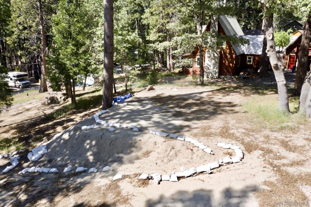 32065 Hunsaker Way Running Springs, CA 92382 - Photo 6 of 39 a view of street with trees