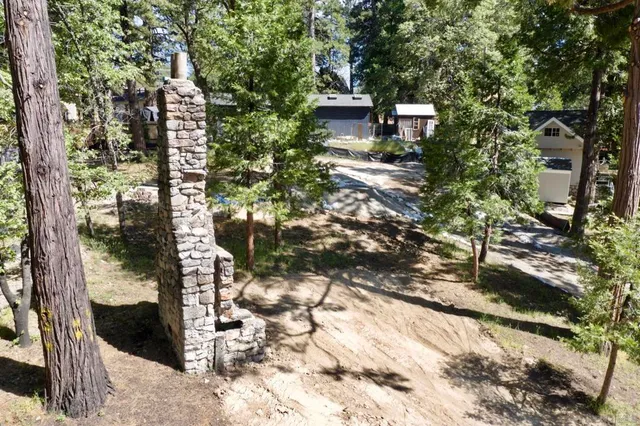 a view of a back yard of the house and a street view