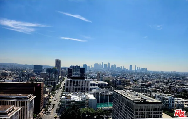 a view of a swimming pool with seating area