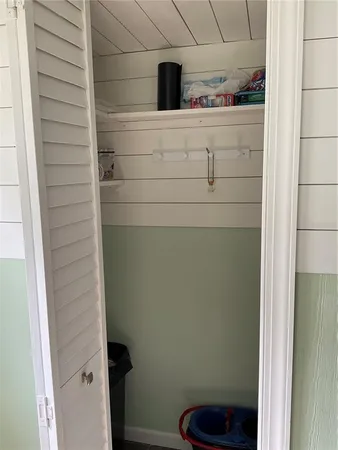 a bathroom with a shower and toilet