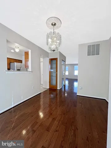 a view of livingroom with hardwood floor and window