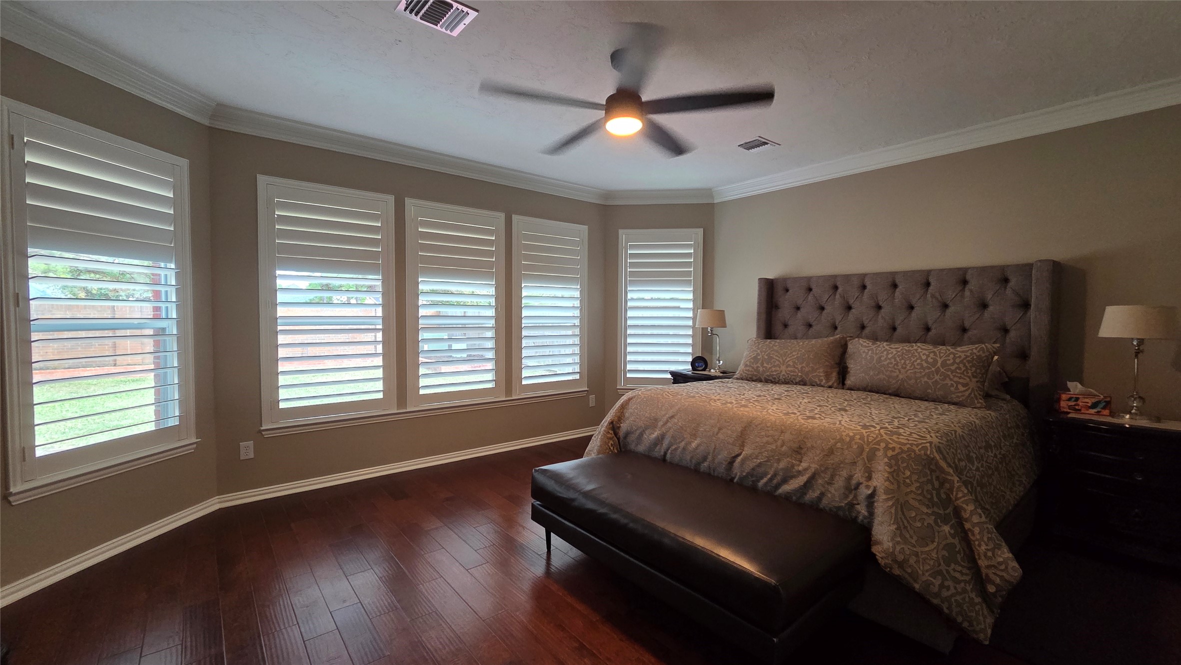 10310 Pitcataway Drive Spring, TX 77379 - Photo 20 of 37 a spacious bedroom with a bed and a large window