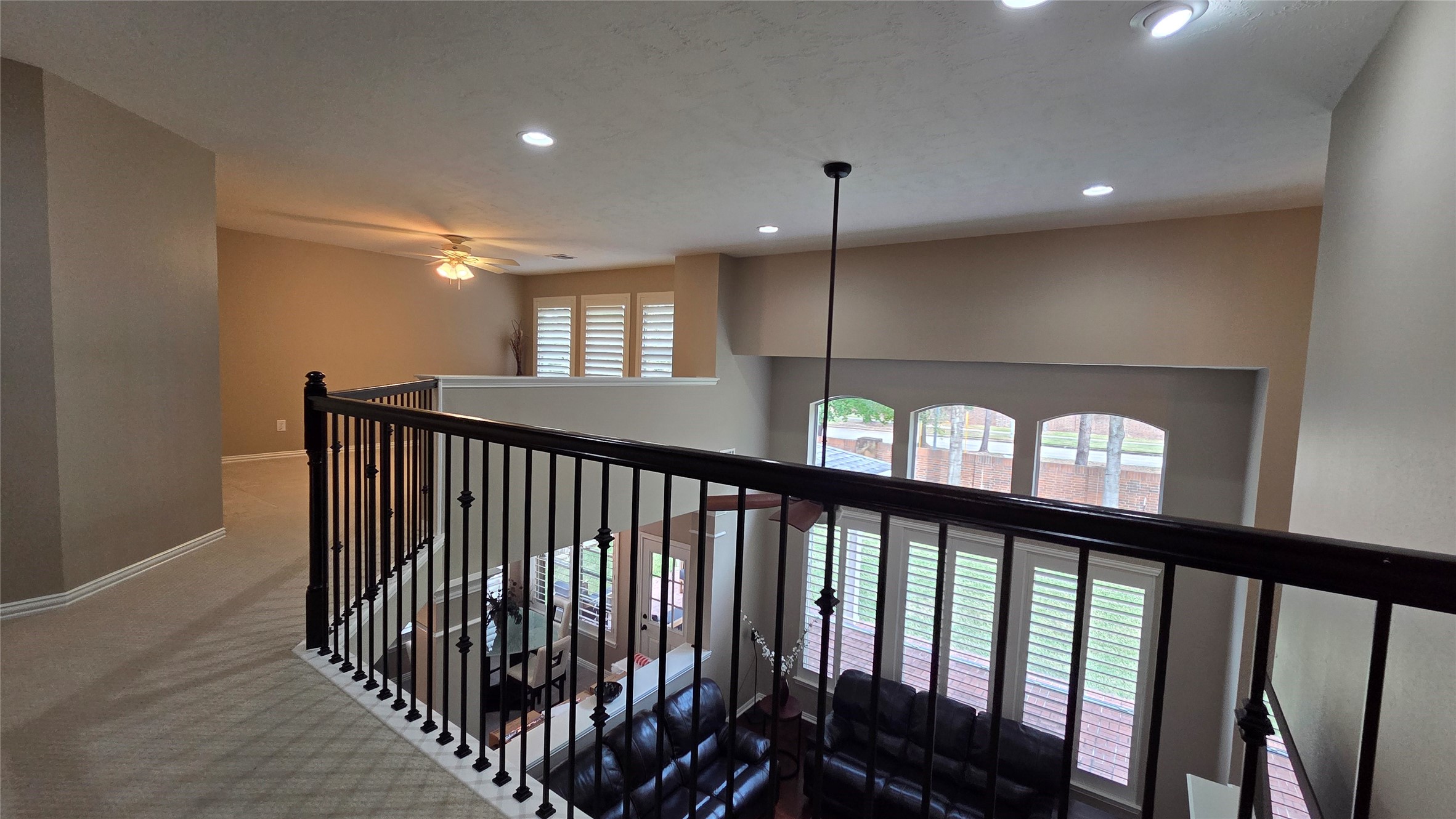 10310 Pitcataway Drive Spring, TX 77379 - Photo 25 of 37 a view of staircase with a large window and wooden floor