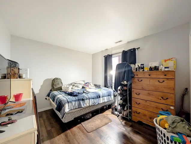 a view of living room and a window