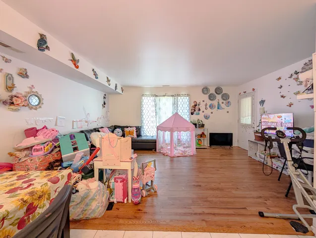 a kitchen with granite countertop appliances and cabinets
