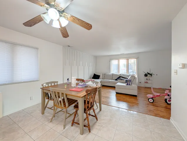 a kitchen with a stove a sink and a refrigerator