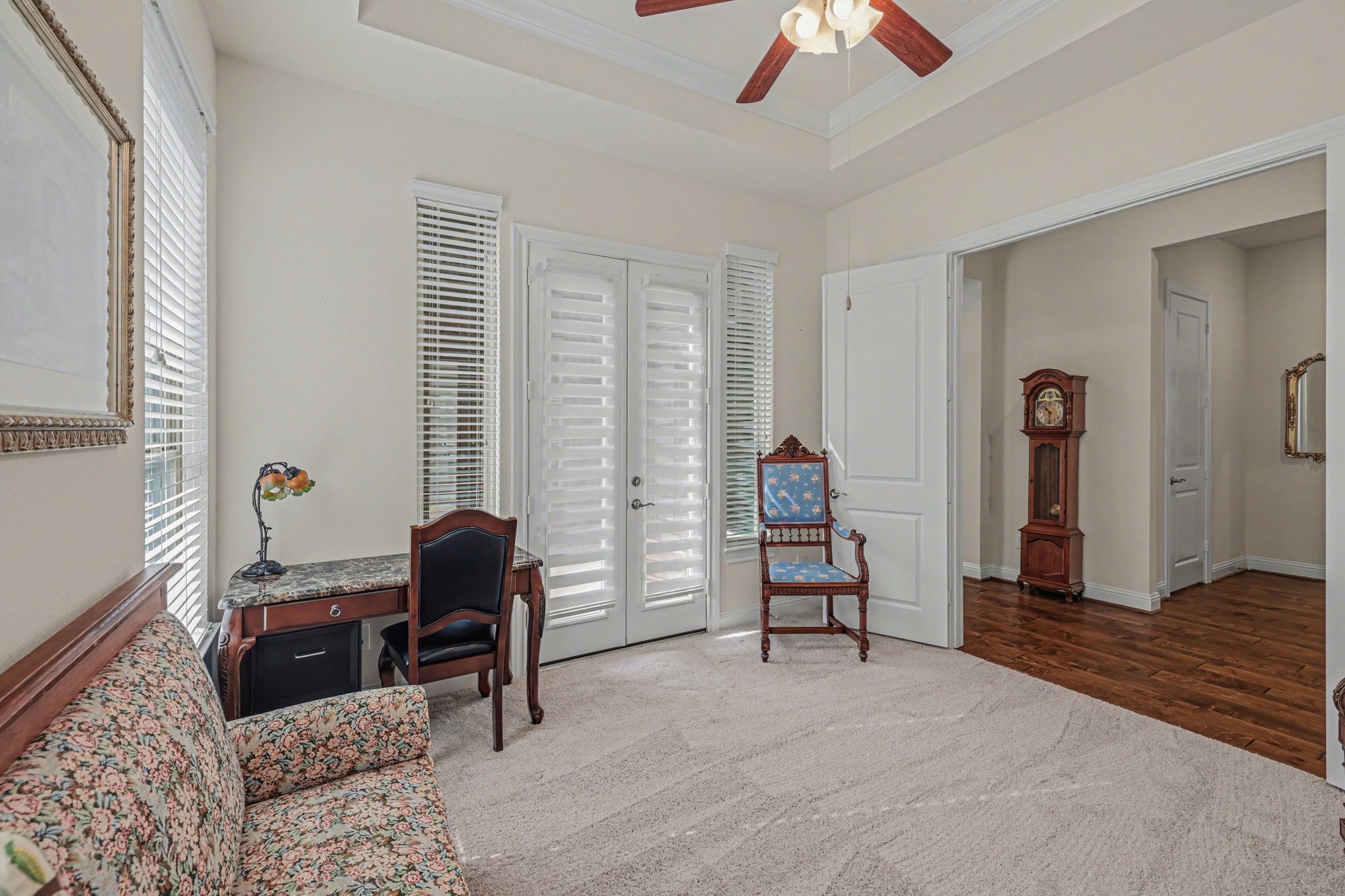 7434 Kearney Hill Lane Spring, TX 77389 - Photo 11 of 36 a living room with furniture and a chandelier