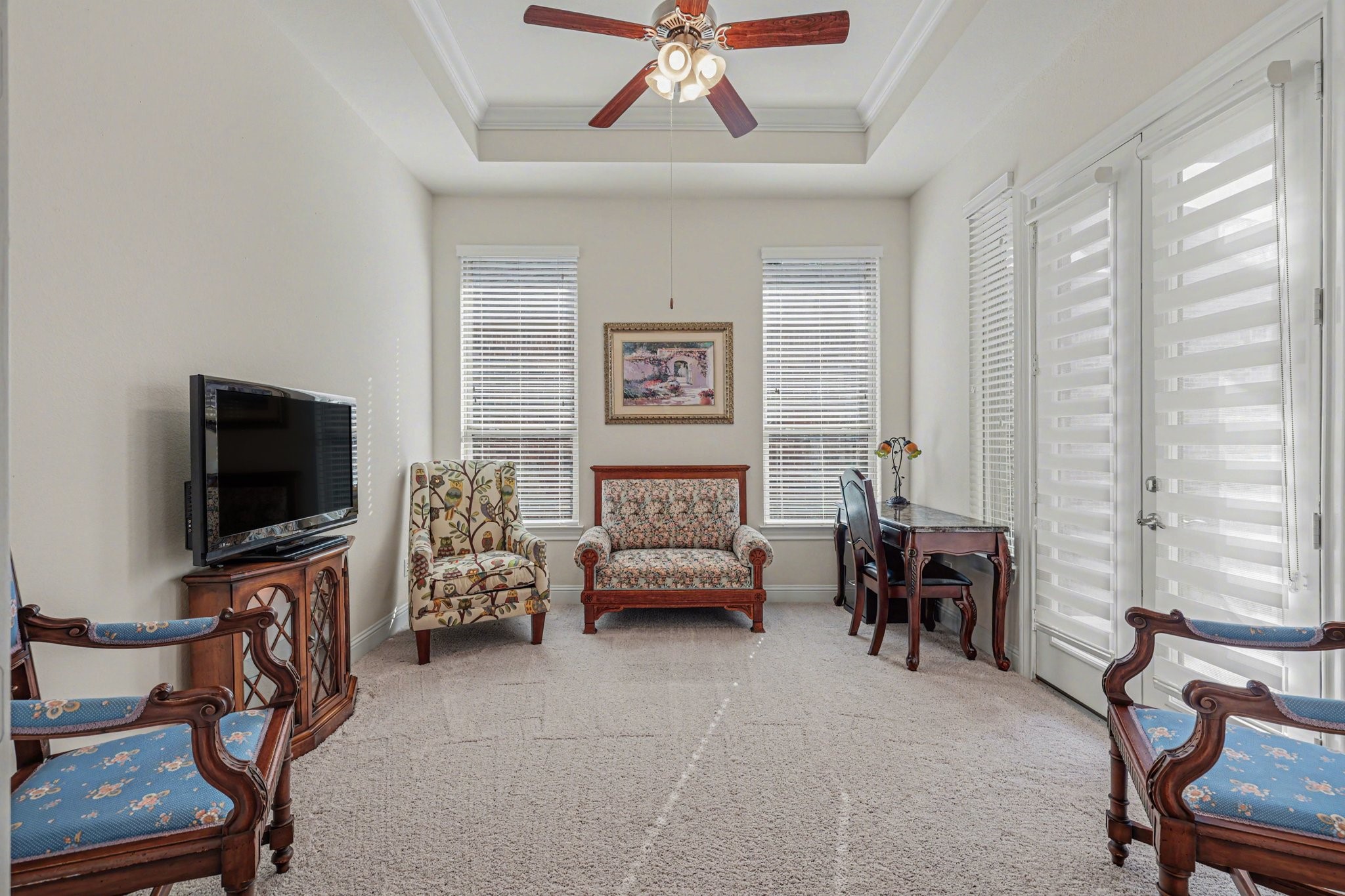 7434 Kearney Hill Lane Spring, TX 77389 - Photo 12 of 36 a bedroom with furniture and a flat screen tv