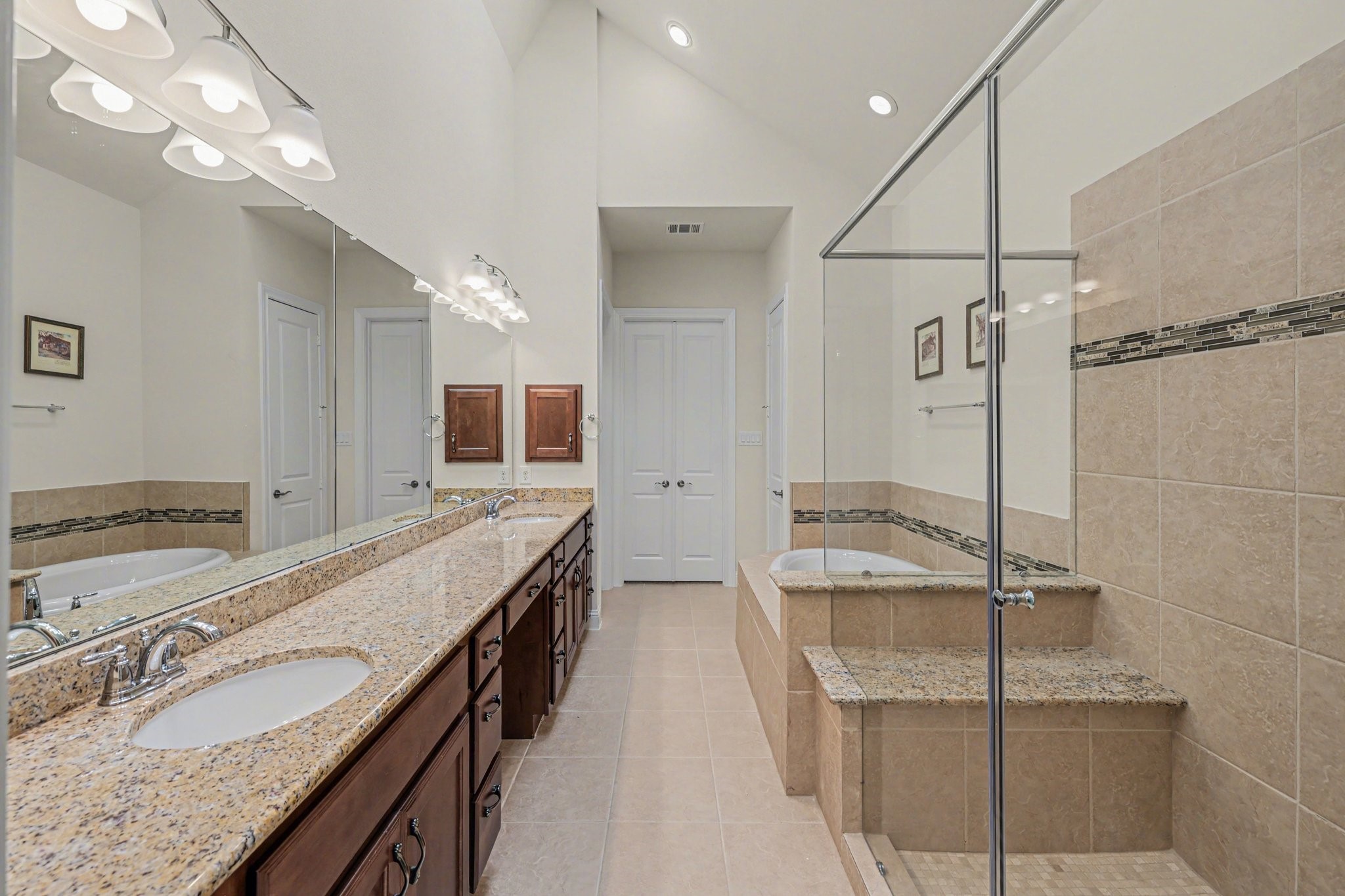 7434 Kearney Hill Lane Spring, TX 77389 - Photo 19 of 36 a bathroom with a granite countertop double vanity sink and mirror
