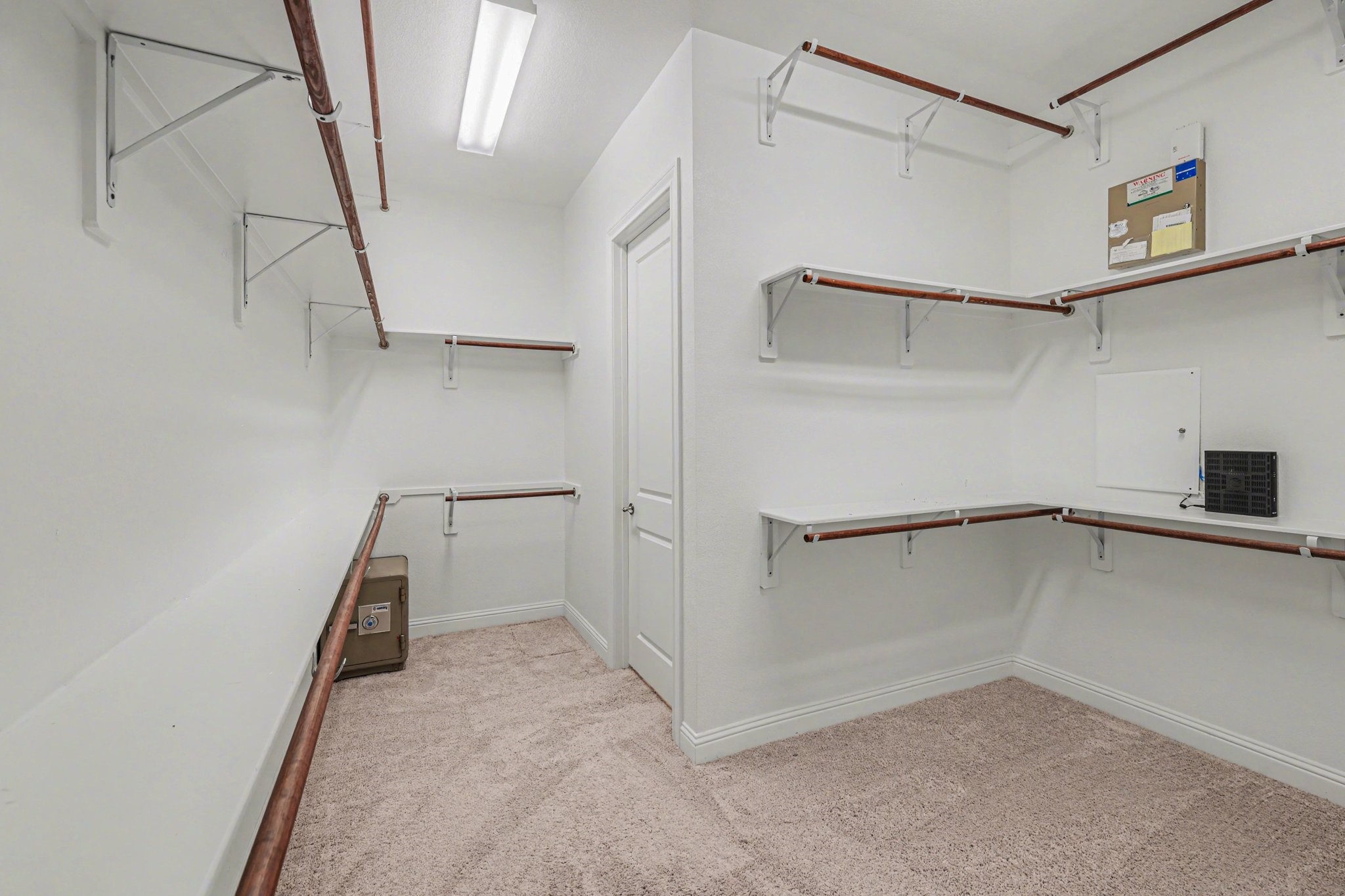 7434 Kearney Hill Lane Spring, TX 77389 - Photo 20 of 36 a view of an empty walk in closet