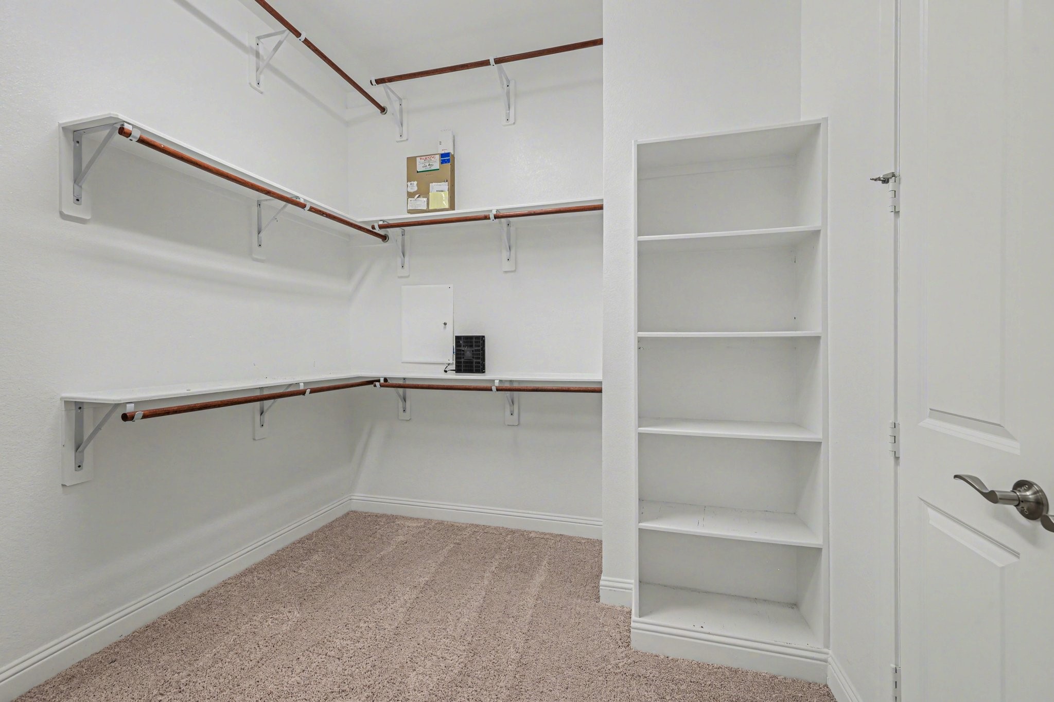 7434 Kearney Hill Lane Spring, TX 77389 - Photo 21 of 36 a view of an empty walk in closet