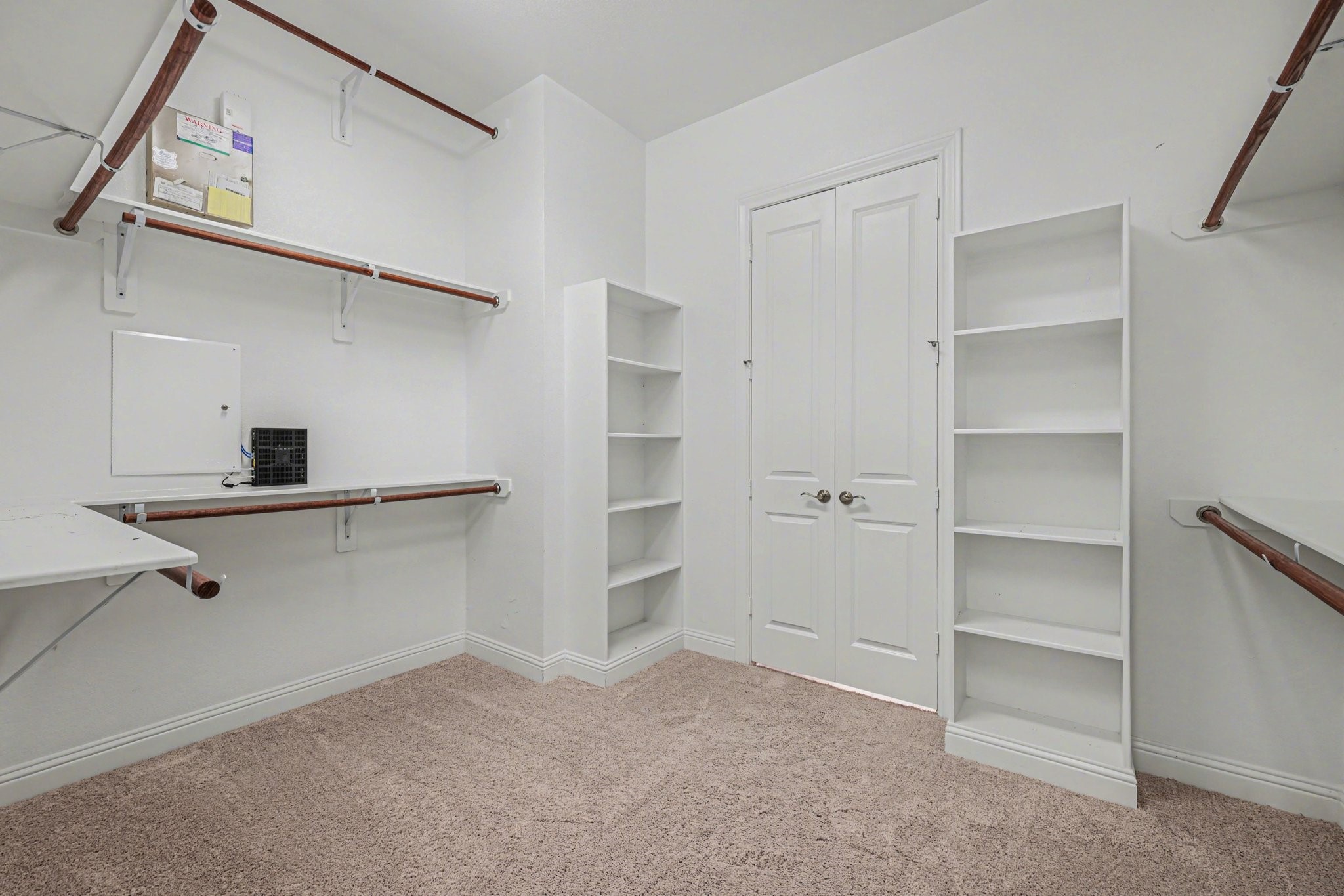 7434 Kearney Hill Lane Spring, TX 77389 - Photo 22 of 36 a view of an empty walk in closet