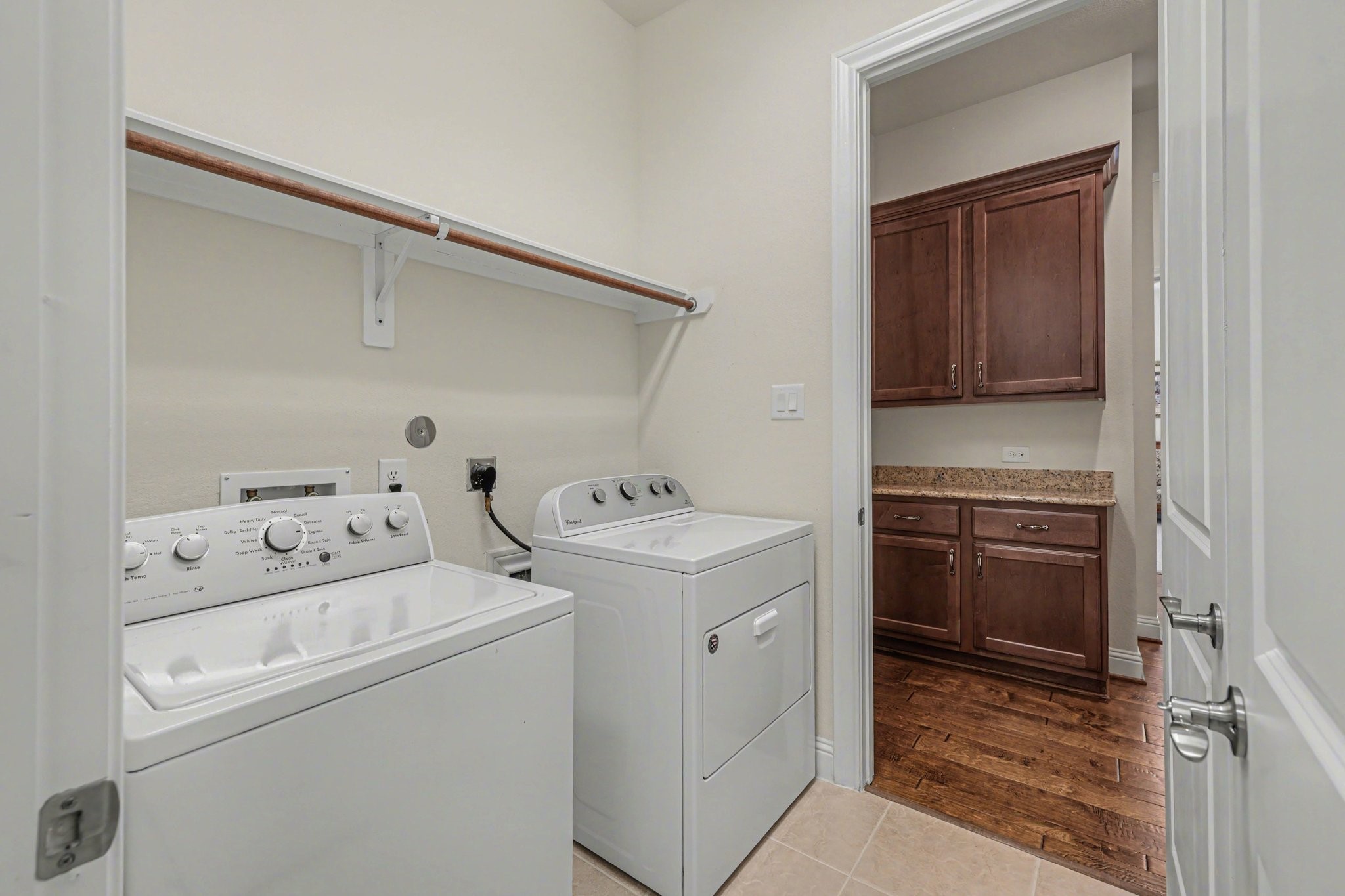 7434 Kearney Hill Lane Spring, TX 77389 - Photo 24 of 36 a utility room with dryer and washer