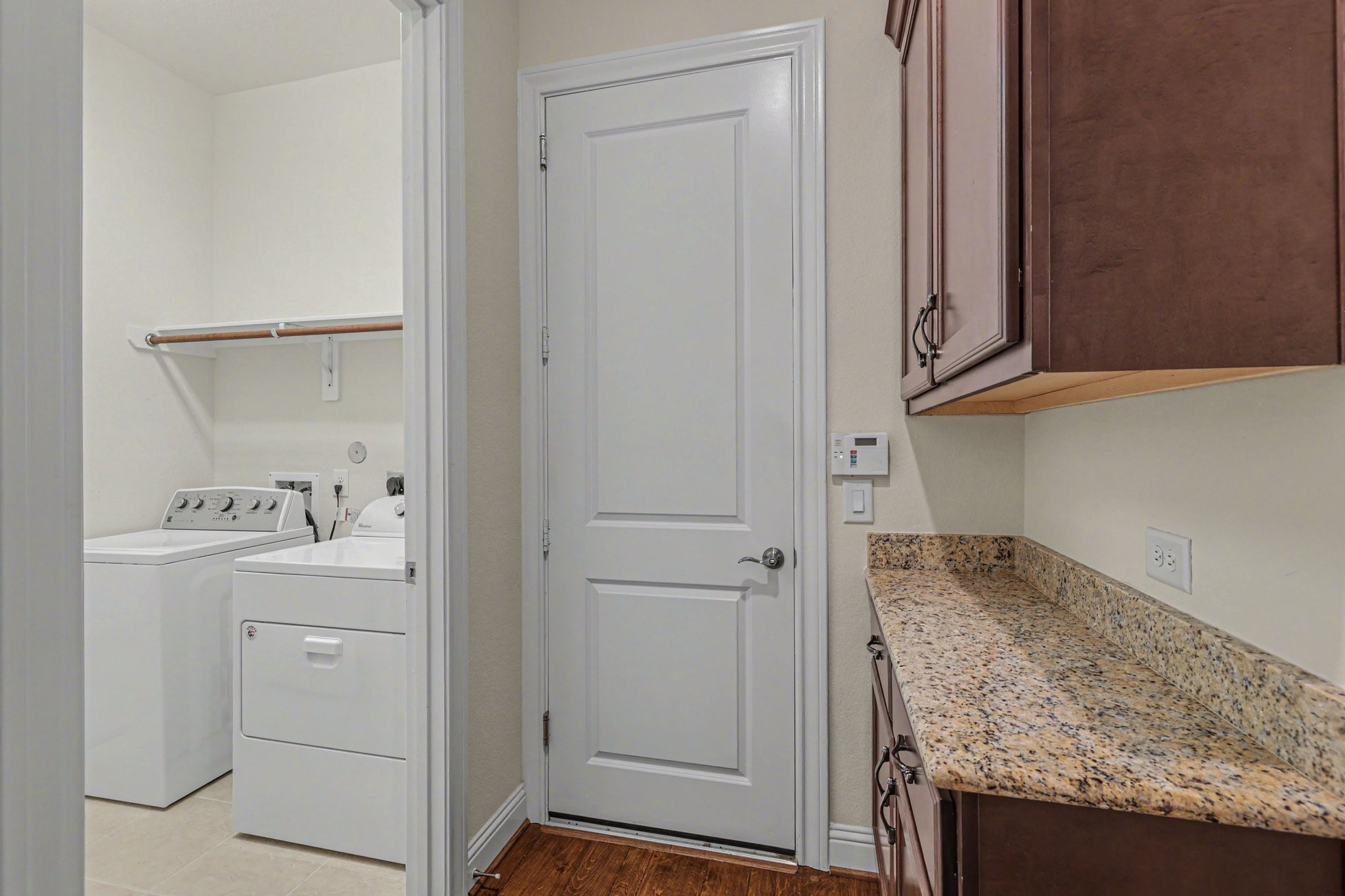 7434 Kearney Hill Lane Spring, TX 77389 - Photo 25 of 36 a view of storage and utility room with washer and dryer