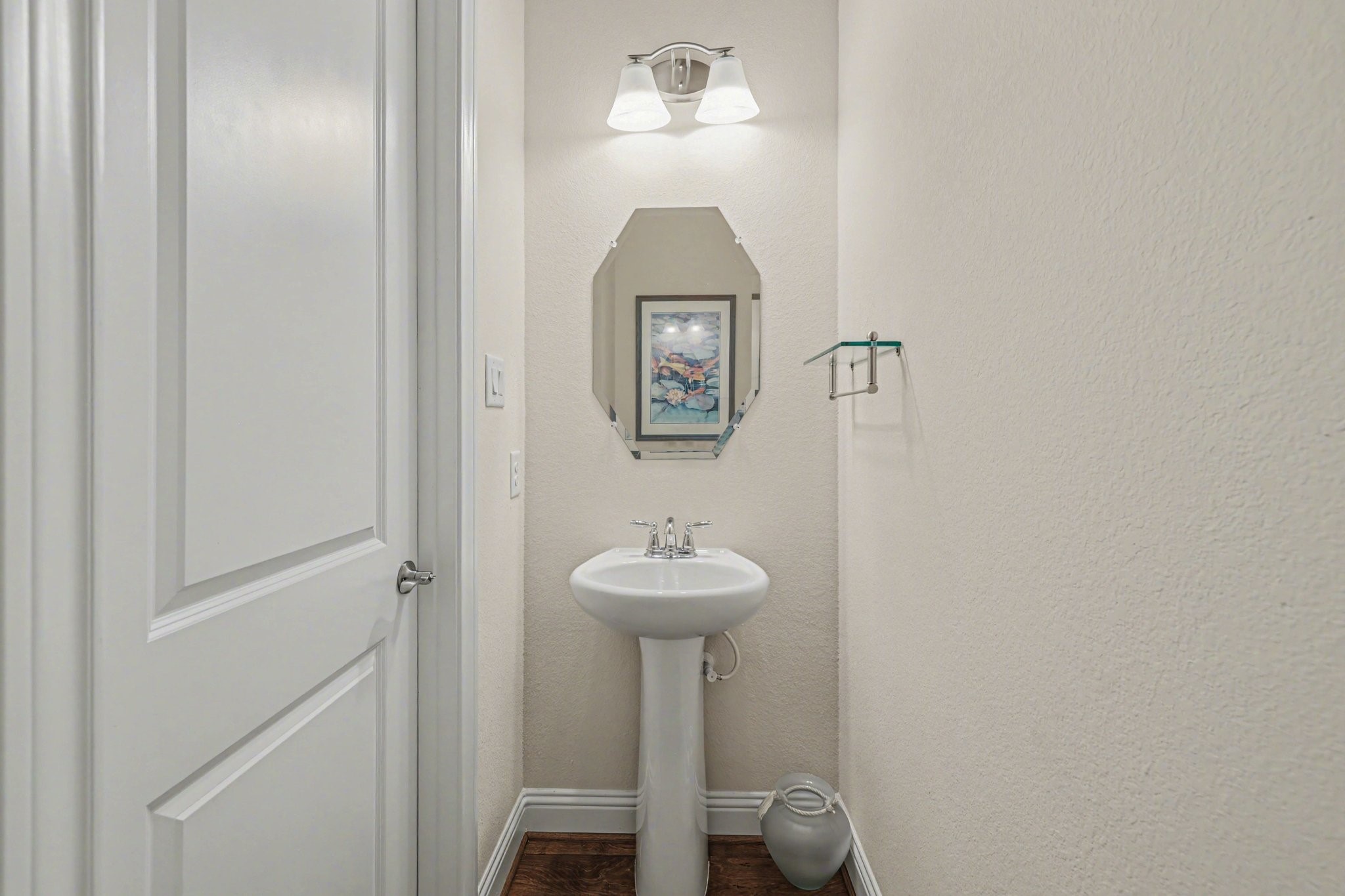 7434 Kearney Hill Lane Spring, TX 77389 - Photo 28 of 36 a bathroom with a sink and a mirror