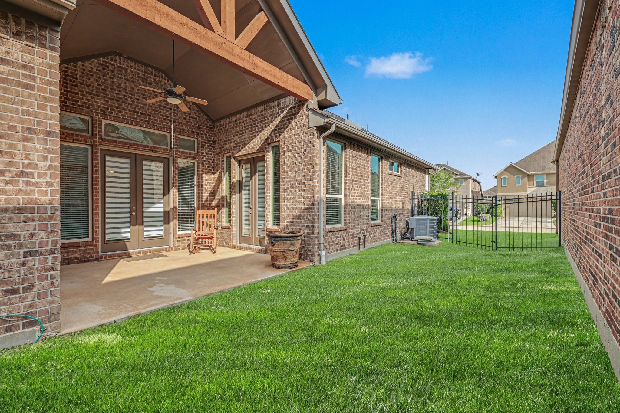 7434 Kearney Hill Lane Spring, TX 77389 - Photo 31 of 36 a view of a house with backyard and porch