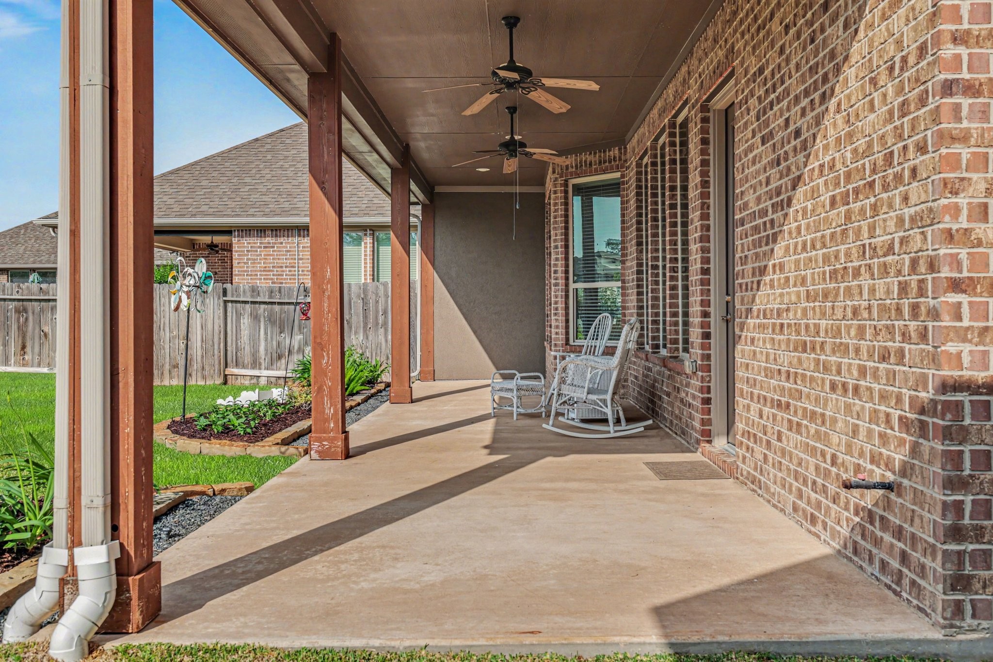 7434 Kearney Hill Lane Spring, TX 77389 - Photo 33 of 36 a view of an entryway with a floor to ceiling window
