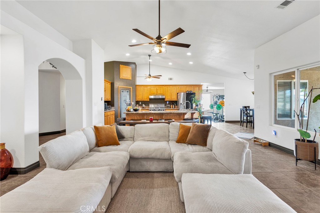 13724 Yuma Road Apple Valley, CA 92307 - Photo 16 of 75 a living room with furniture and kitchen view