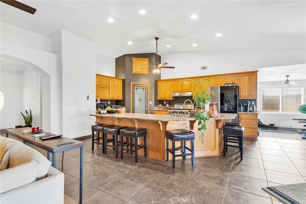 13724 Yuma Road Apple Valley, CA 92307 - Photo 17 of 75 a view of a dining room with furniture and a large window