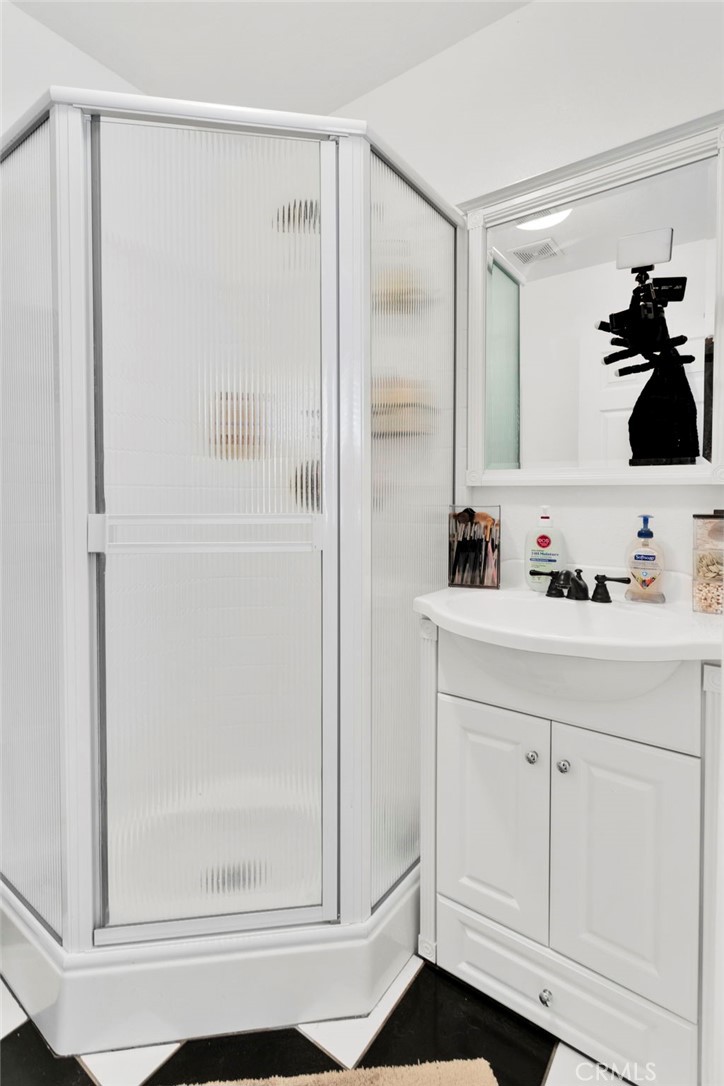 13724 Yuma Road Apple Valley, CA 92307 - Photo 71 of 75 a bathroom with a shower and a sink