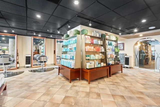 a outdoor space with lots of furniture and a chandelier