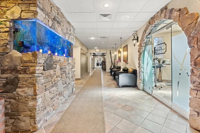 a view of a lobby with black and white walls