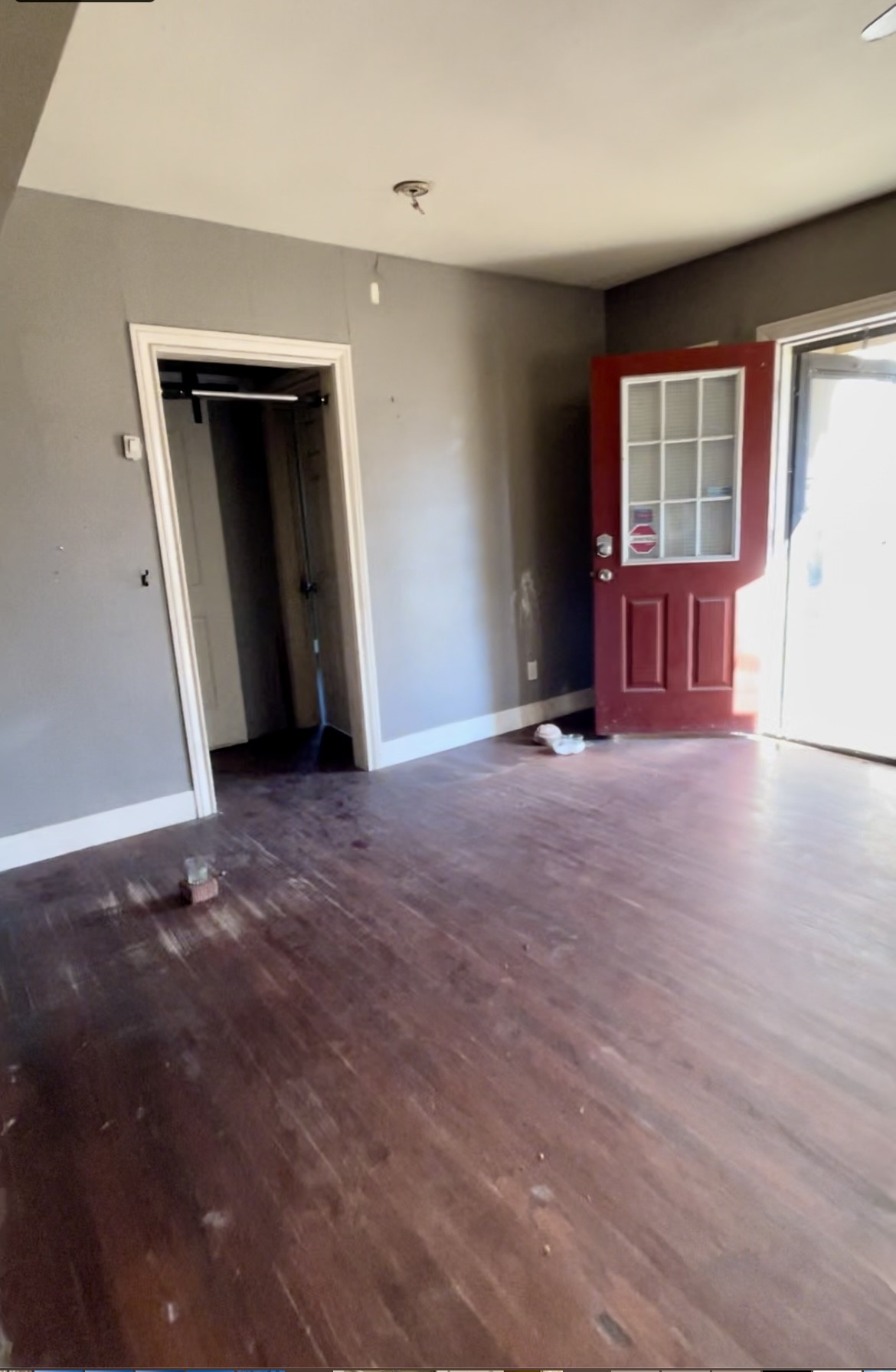 7821 Detroit Street Houston, TX 77017 - Photo 5 of 6 a view of an empty room with wooden floor and a window
