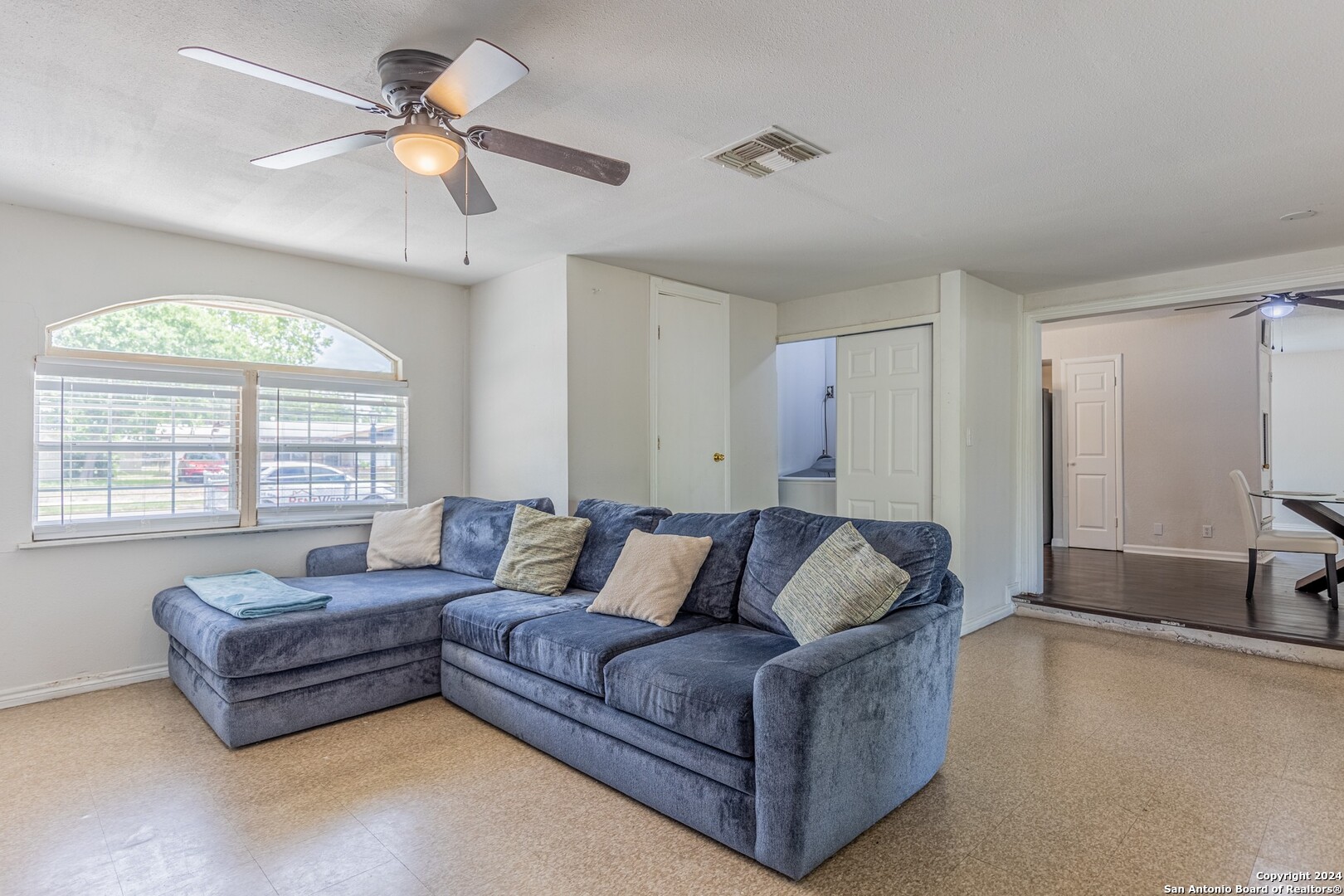 7802 Rimfire Drive San Antonio, TX 78227 - Photo 18 of 39 a living room with furniture and a large window