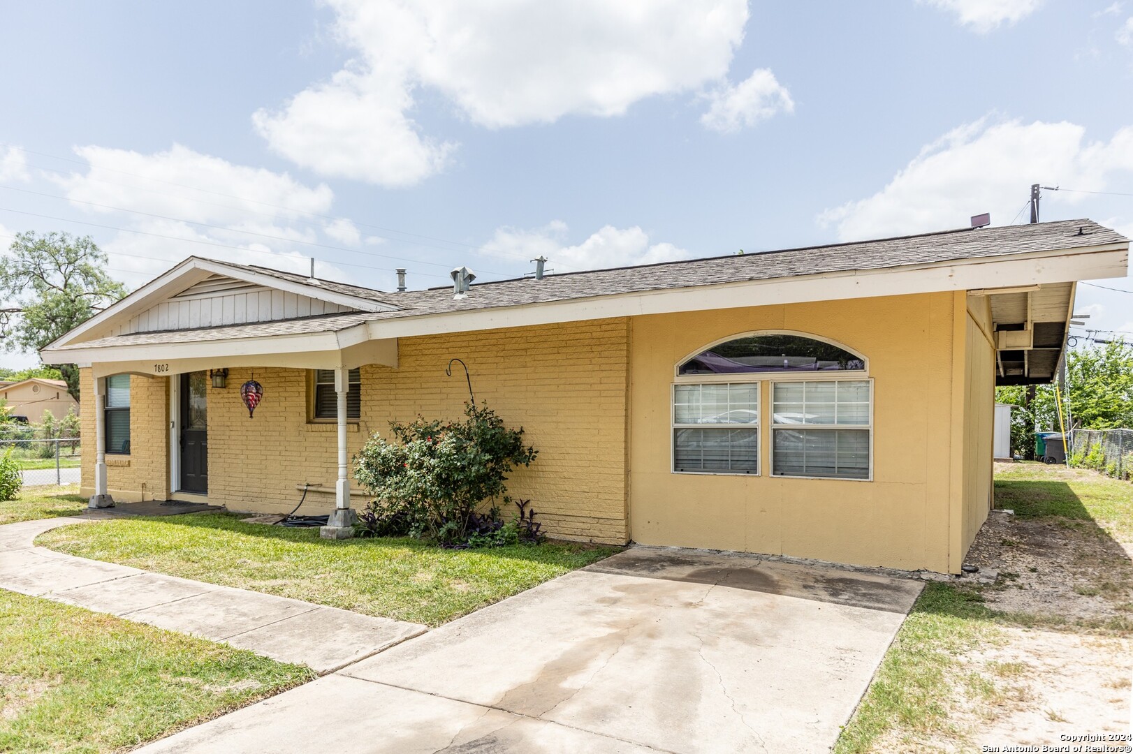 7802 Rimfire Drive San Antonio, TX 78227 - Photo 2 of 39 a front view of a house with garden