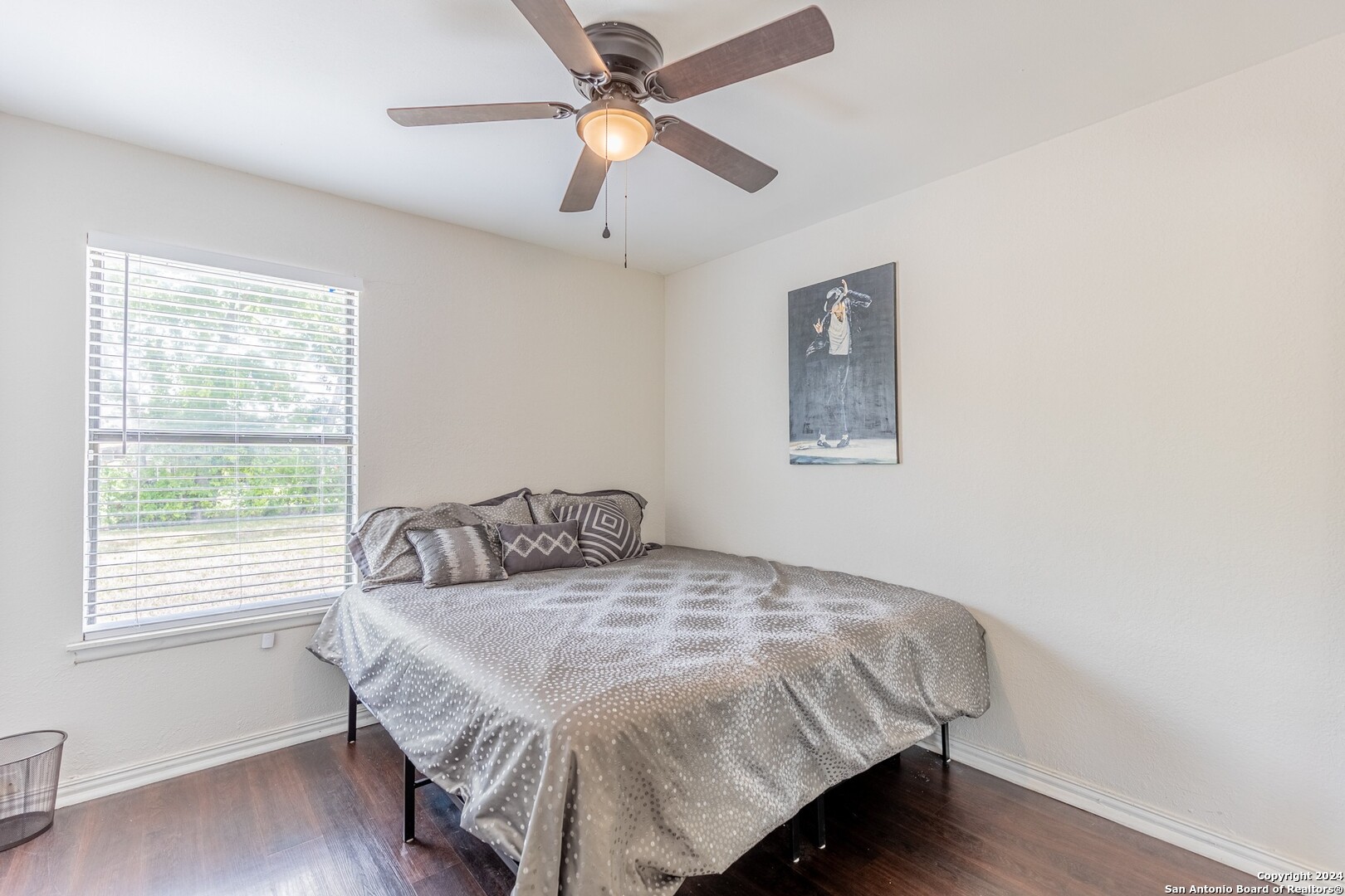 7802 Rimfire Drive San Antonio, TX 78227 - Photo 32 of 39 a bedroom with a bed and a window