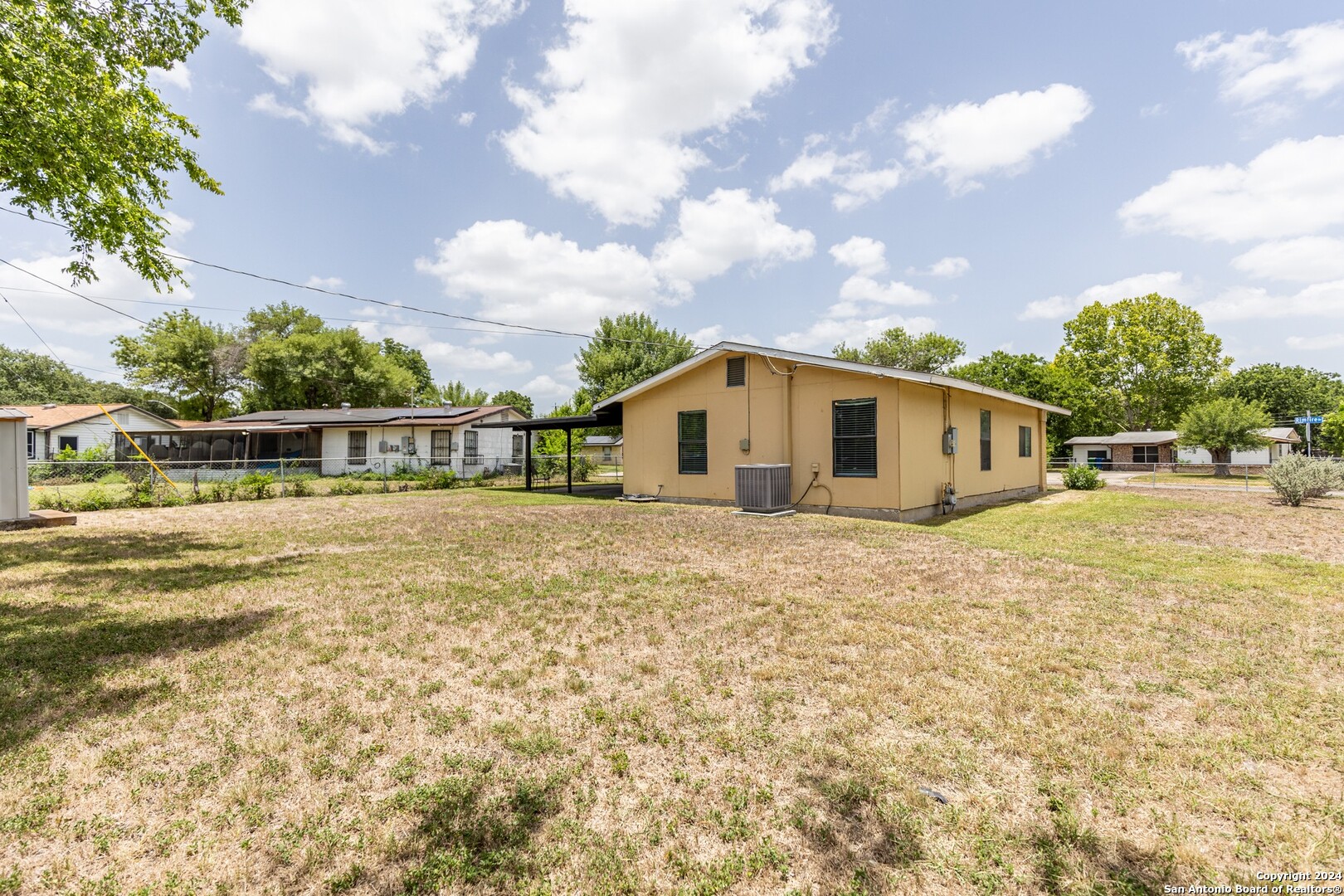 7802 Rimfire Drive San Antonio, TX 78227 - Photo 36 of 39 a front view of a house with a garden